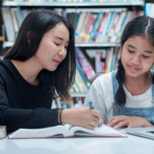 Teacher,And,Student,Asia.teacher,And,Girl,At,Laptop