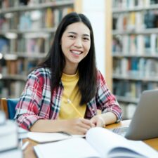 University,Library,Study:,Portrait,Of,A,Smart,Beautiful,Asian,Girl